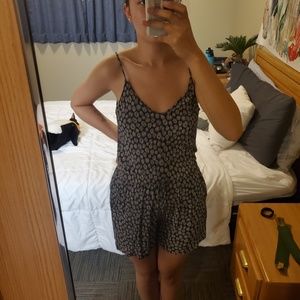 Navy blue romper with white flowers